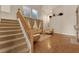 Stylish living room showcasing hardwood floors, staircase access, and cozy seating at 8512 Porch Rocker St, Las Vegas, NV 89143