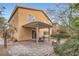 Charming two-story home featuring a backyard patio with a pergola and well-maintained landscaping at 857 White Sparrow St, Henderson, NV 89052