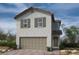 Two-story home featuring gray siding, a two-car garage and complemented by simple landscaping at 9059 Rivington Ave, Las Vegas, NV 89148