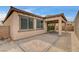 Enclosed backyard patio with brick pavers, providing a private outdoor space at 907 Gallery Course Dr, Las Vegas, NV 89148