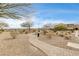 Community park walkway surrounded by gravel and landscaped greenery at 907 Gallery Course Dr, Las Vegas, NV 89148