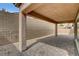 Covered backyard patio featuring brick pavers and plenty of space for activities at 907 Gallery Course Dr, Las Vegas, NV 89148
