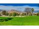 Well-manicured golf course with mountain views, offering a serene and picturesque backdrop at 907 Gallery Course Dr, Las Vegas, NV 89148