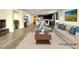 Spacious living room featuring modern furnishings, neutral tones, and an open floor plan at 907 Gallery Course Dr, Las Vegas, NV 89148
