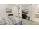 A well-lit bedroom with a bed, desk, and furnishings; bathroom is visible at 9144 Las Manaitas Ave # 201, Las Vegas, NV 89144