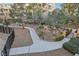Well-maintained community featuring walking paths and greenery at 9144 Las Manaitas Ave # 201, Las Vegas, NV 89144