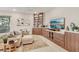 The living room features built-in cabinets and shelving, creating a cozy and functional space at 9144 Las Manaitas Ave # 201, Las Vegas, NV 89144