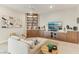 This living room boasts a comfortable seating area and modern built-in storage solutions at 9144 Las Manaitas Ave # 201, Las Vegas, NV 89144