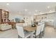 An open-concept layout features a spacious living room, dining area, and a well-equipped kitchen at 9144 Las Manaitas Ave # 201, Las Vegas, NV 89144