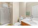 Cozy bathroom featuring a glass enclosed shower and neutral tiling at 9869 White Lilac St, Las Vegas, NV 89178
