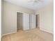 Spacious carpeted bedroom features a double closet and a window for natural light and storage at 9869 White Lilac St, Las Vegas, NV 89178