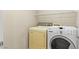 Laundry room featuring side-by-side washer and dryer at 9869 White Lilac St, Las Vegas, NV 89178