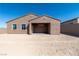 A new construction home featuring a covered patio and a large, private backyard at 1005 Warsaw Ave, Henderson, NV 89015