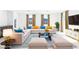 Sun-filled living room with a comfortable sofa and modern décor at 1005 Warsaw Ave, Henderson, NV 89015