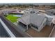 Aerial view of a modern backyard with sports court, and covered patio at 10420 Luella Ct, Las Vegas, NV 89143