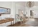 Inviting home foyer featuring stylish decor, wood flooring, and a charming ambiance at 10420 Luella Ct, Las Vegas, NV 89143
