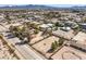 An aerial shot showcasing properties in the neighborhood; this lot offers plenty of room and potential at 10615 Rancho Destino Rd, Las Vegas, NV 89183