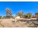 Wide-open backyard with storage shed at 10615 Rancho Destino Rd, Las Vegas, NV 89183