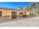 Welcoming single-story house with a double-door entrance and brick accents, offering a warm and inviting facade at 10615 Rancho Destino Rd, Las Vegas, NV 89183