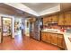 Spacious kitchen with stainless steel appliances, pantry, and tiled flooring at 10615 Rancho Destino Rd, Las Vegas, NV 89183
