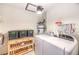 Functional laundry room with washer, dryer, and storage at 10615 Rancho Destino Rd, Las Vegas, NV 89183
