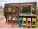 Outdoor space with a spa and colorful seating, perfect for relaxation and entertaining at 1201 Madison Ave, Las Vegas, NV 89106