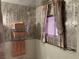 Bathroom featuring pink accessories and patterned wall and floor tiles at 1201 Madison Ave, Las Vegas, NV 89106