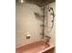 Bathroom featuring pink bathtub and updated shower head and fixtures at 1201 Madison Ave, Las Vegas, NV 89106