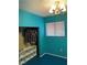 Bedroom with blue walls, ceiling fan, closet with organizer, and window with blinds at 1201 Madison Ave, Las Vegas, NV 89106