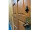 Detailed view of a wooden door with vintage hardware at 1201 Madison Ave, Las Vegas, NV 89106