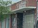 Charming building exterior with signage 'Annie's Kitchen' and artistic accents, located in a community setting at 1201 Madison Ave, Las Vegas, NV 89106