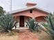 Inviting front entrance with desert landscaping, and a beautiful walkway at 1201 Madison Ave, Las Vegas, NV 89106