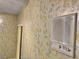 Interior wall featuring an intercom system and decorative wallpaper at 1201 Madison Ave, Las Vegas, NV 89106