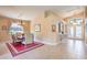 Dining area with double door entrance and tile flooring at 1363 Rolling Sunset St, Henderson, NV 89052
