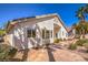 Attractive single-story home with desert landscaping, flagstone walkway, and a well-maintained exterior at 1363 Rolling Sunset St, Henderson, NV 89052