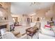 Spacious living room with fireplace, neutral colors, and open floor plan at 1363 Rolling Sunset St, Henderson, NV 89052