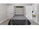 Bedroom includes closet, door to hallway, soft carpet, and queen bed at 1395 Logandale Dr, Logandale, NV 89021
