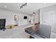 Large bonus room with air hockey table, perfect for entertainment and recreation at 1395 Logandale Dr, Logandale, NV 89021