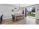 Bright dining area with a slider door leading to the backyard at 1395 Logandale Dr, Logandale, NV 89021