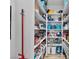 Well-organized walk-in pantry with lots of shelving for ample storage space and easy access to food items at 1395 Logandale Dr, Logandale, NV 89021