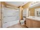 Well-lit bathroom with a shower-tub combo, and a vanity with storage at 1851 Hillpointe Rd # 2412, Henderson, NV 89074