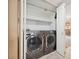 Convenient laundry closet with modern washer and dryer units at 1851 Hillpointe Rd # 2412, Henderson, NV 89074