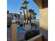 Balcony view of the community pool and surrounding landscaping at 1851 Hillpointe Rd # 2412, Henderson, NV 89074