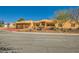 Charming single-story home with a two-car garage and desert landscaping at 2201 Rosanna St, Las Vegas, NV 89117