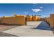 A beautiful stucco home with a gated entrance, concrete driveway, and secure perimeter wall for added privacy at 2201 Rosanna St, Las Vegas, NV 89117