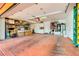 Spacious garage featuring built-in storage, water heater, and ample room for parking and projects at 2201 Rosanna St, Las Vegas, NV 89117