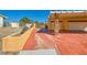 Two-car garage with colorful driveway at 2201 Rosanna St, Las Vegas, NV 89117
