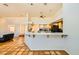 Open kitchen with breakfast bar seamlessly connects to the living area at 2201 Rosanna St, Las Vegas, NV 89117