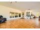 Spacious sun room with tile flooring, ceiling fans, and natural light at 2201 Rosanna St, Las Vegas, NV 89117