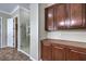 Bathroom featuring a glass enclosed shower and custom cabinets for storage at 2220 Canyonville Dr, Henderson, NV 89044